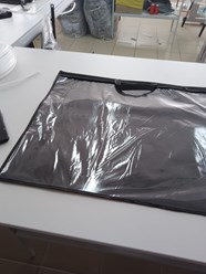 Упаковка (тип конверт) для подушек,  курток, пуховиков. Размеры 50*70. Задняя часть , окантовка, ручка - Спанбонд.  Передняя часть ПВХ или ПВД. Молния рулонная