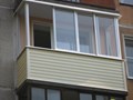 Остекление балкона с внешней отделкой сайдингом