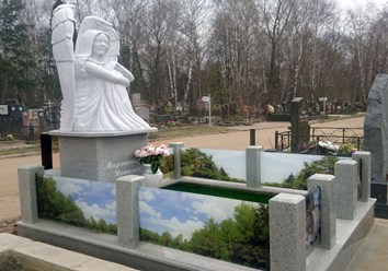 памятник в виде ангела на могилу из мрамора