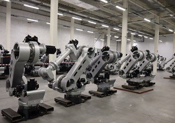 Промышленные роботы RusRobot для перемещения грузов