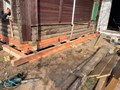 Подъем дома для ремонта фундамента