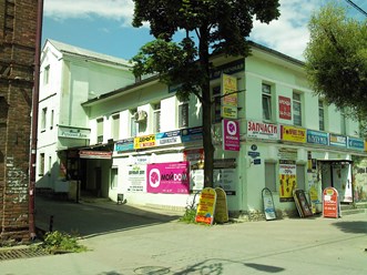 Офисное здание Советский пр. 51, между магазинами РивГош и Робинзон. Вход со стороны РивГош.