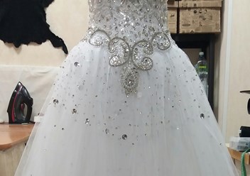 Подгонка свадебных платьев по фигуре