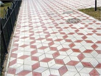 Тротуарная плитка "Ромб"производства компании "Стройтехник" красного и серого цветов.