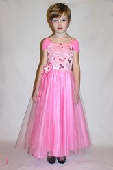 Детское нарядное платье розового цвета. Обхват талии 55-63 см. обхват груди 58-66 см. Длина юбки от талии 68 см. Модель на фото немного выше.