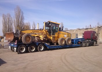 Перевозка автогрейдера на трале