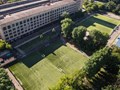 Два футбольных поля с искусственным покрытием размером 100х62 метра и 82х62 метра.