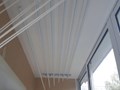 отделка балкона панелями ПВХ и установка сушилки