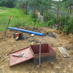 Кессон для скважины на воду с установкой под ключ на участке