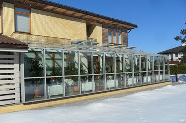 Остекление зимнего сада из профиля Реалит RF50, окна из профиля Реалит RW64, мансардные окна с электроприводом