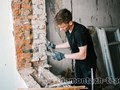 Демонтаж кирпичных стен