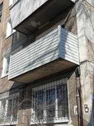 Отделка балкона сайдингом