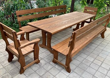 Набор садовой мебели из дерева: стол 2,5х0,9 м, скамейка 2,5 м - 2 шт., кресло - 2 шт. Массив лиственницы. Цена 88500 руб.