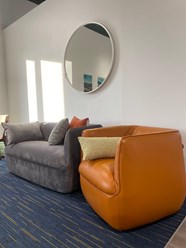 Дизайнерский диван Spin в обивке из велюра и кресло из натуральной кожи