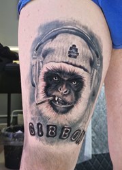 Тату в стиле реализм. Портрет гиббона.