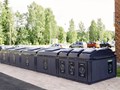 Мусорные контейнеры MOLOK Domino во дворе дома