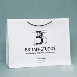 Фирменный пакет из элитной крафтовой бумаги. Бумажный пакет с верёврчными ручками.