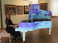 Проекция на рояль - как будто сама музыка находит свое визуальное отображение