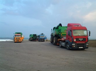 Перевозка комбайнов на колесах
