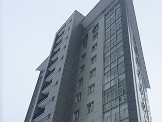 Двенадцатиэтажный жилой дом треугольник
