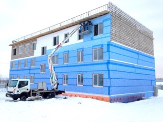 Аренда автовышки для фасадных работ
