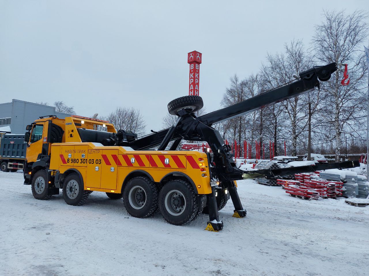 Грузовой эвакуатор RENAULT TRUCKS K440 DXI13 8*4 с американской установкой Century 9055.